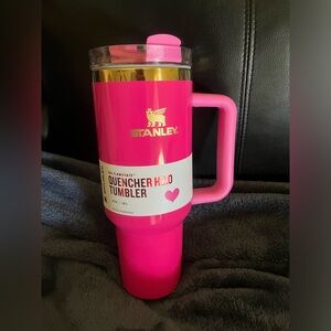 Very pretty Watermelon color smooth finish with a gold band new in box.